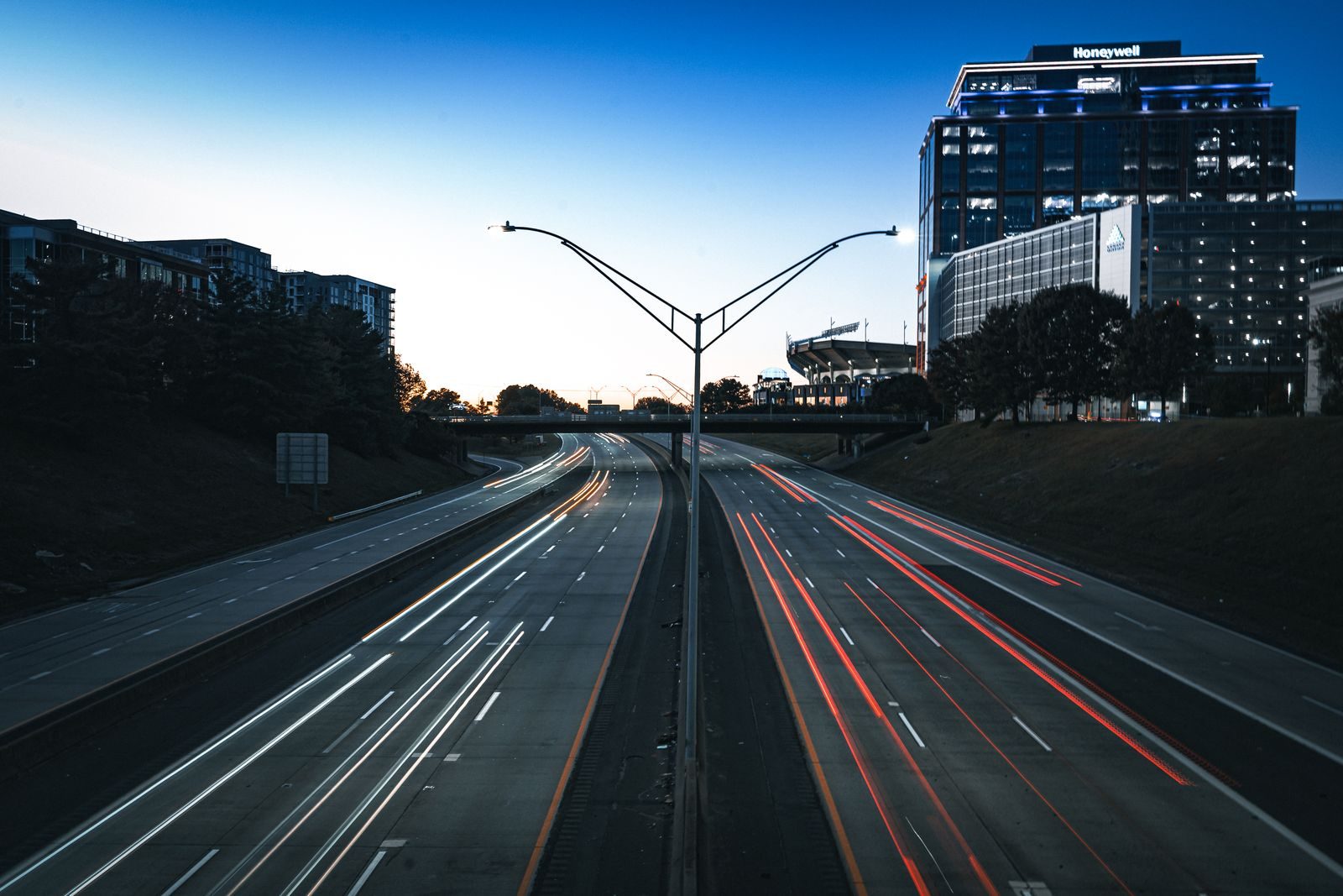 Traffic light trails on the interstate through uptown Charlotte, North Carolina at dusk